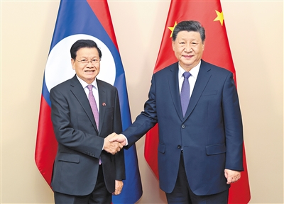 【人民日報(bào)】習(xí)近平會見老撾人民革命黨中央總書記、國家主席通倫