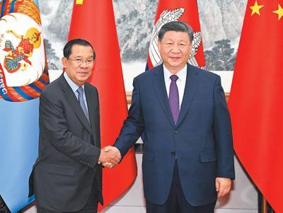 【人民日?qǐng)?bào)】習(xí)近平同柬埔寨人民黨主席、參議院主席洪森會(huì)談